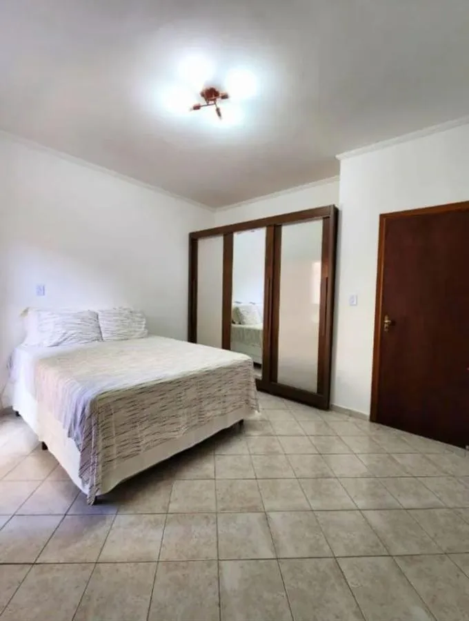 Imagem Casa para Venda em Praia Grande, Guilhermina, 2 dormitórios, 2 suítes, 1 banheiro, 1 vaga