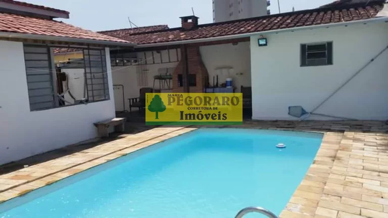 Imagem Casa com Piscina à venda na Prainha Caraguatatuba, 2 quartos, 1 suíte, 1 sala, 3 banheiros, 2 vagas