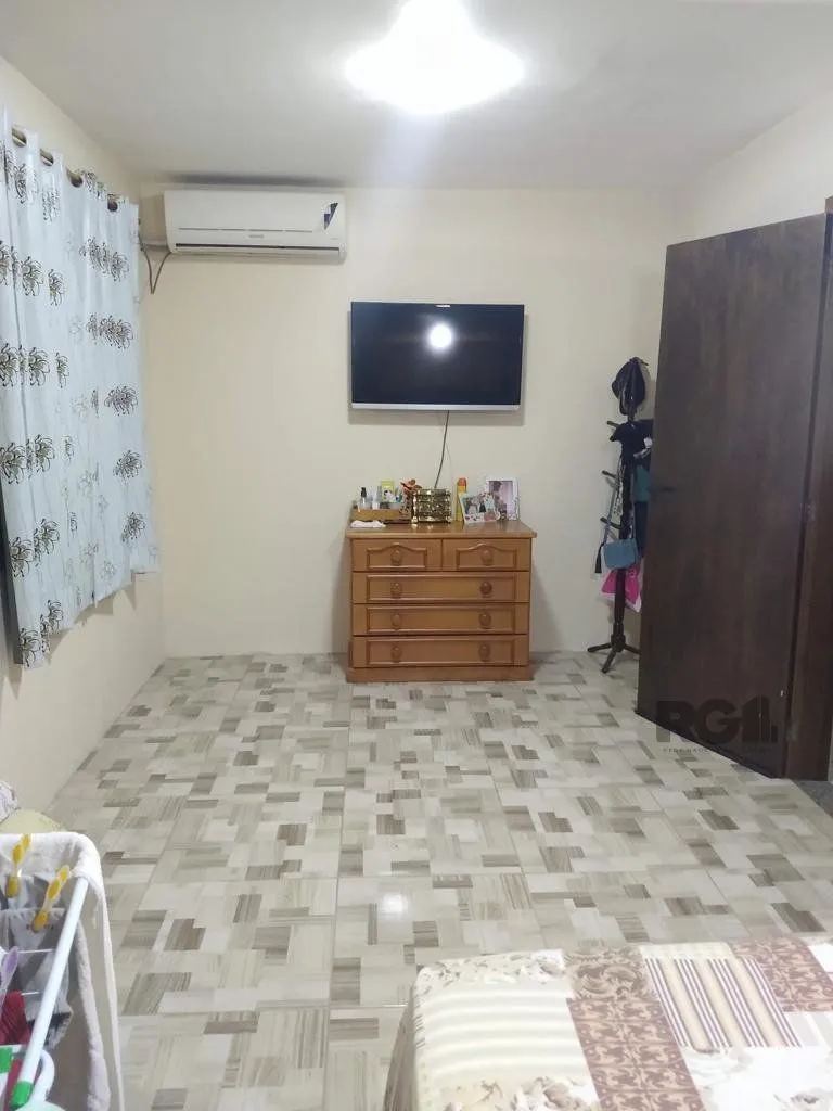 Imagem Casa 3 quartos, 4 vagas, salão de festa, sacada 198m² bairro Rubem Berta, Poa/RS