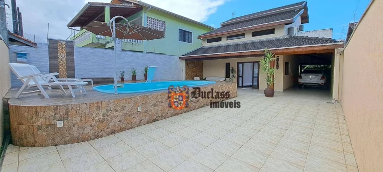 Foto do imóvel Sobrado com 4 dormitórios à venda, 246 m² por R$ 1.000.000,00 - Jardim Aruan - Caraguatatuba/SP