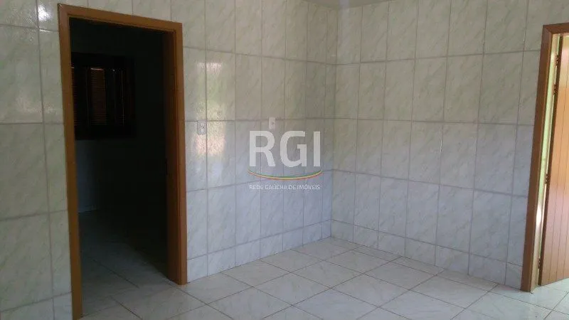 Imagem Casa para Venda - 100m², 3 dormitórios, 2 vagas - Centro