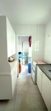 Imagem 2 dormitórios, 2 banheiros, sala para 2 ambientes, cozinha, área de serviço, 1 vaga de garagem