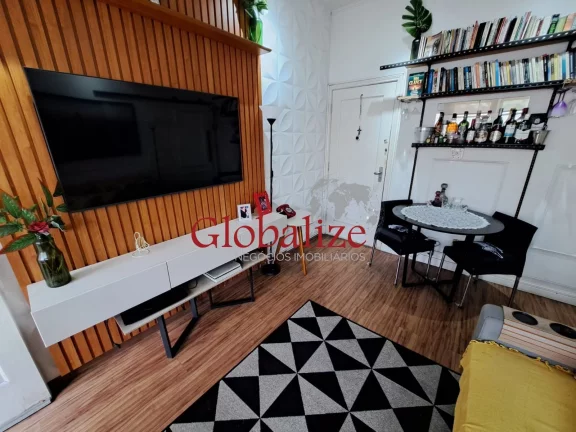 Imagem Apartamento à venda com 94m², 2 quartos, dependência, varanda de frente por R$580.000,00 no Gonzaga em Santos