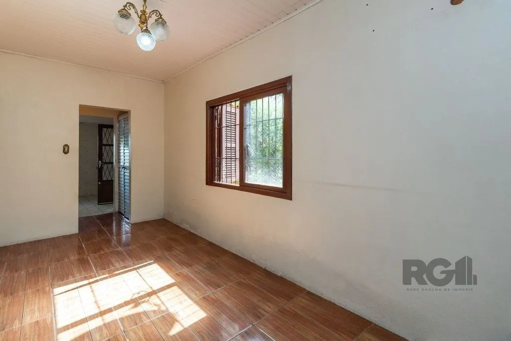 Imagem Casa de 4 dormitórios no bairro Camaquã