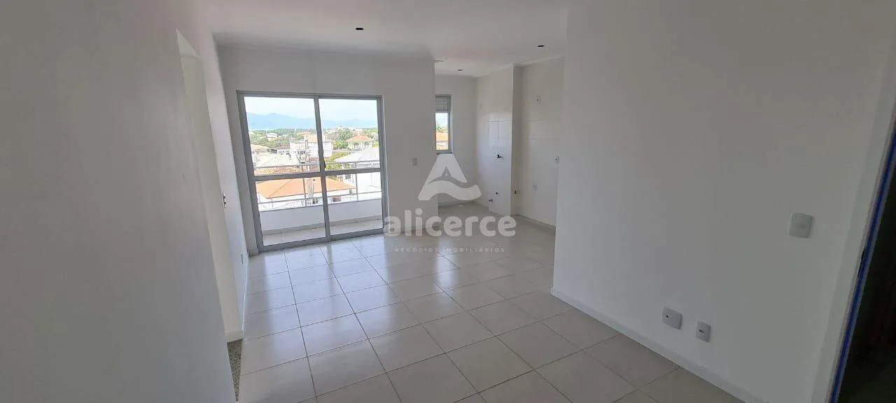 Imagem Apartamento novo em Palhoça, andar alto, com elevador, pertinho do mar e com vista para o morro do Cambirela.