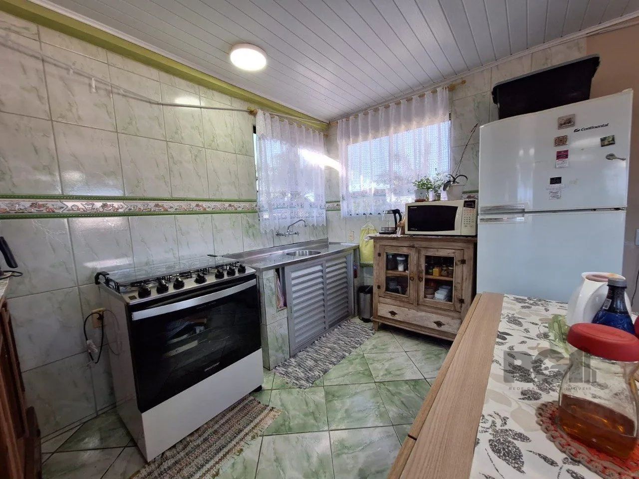 Imagem Casa com 3 dormitórios, suíte, lareira, Jardim Algarve em Alvorada - RS.