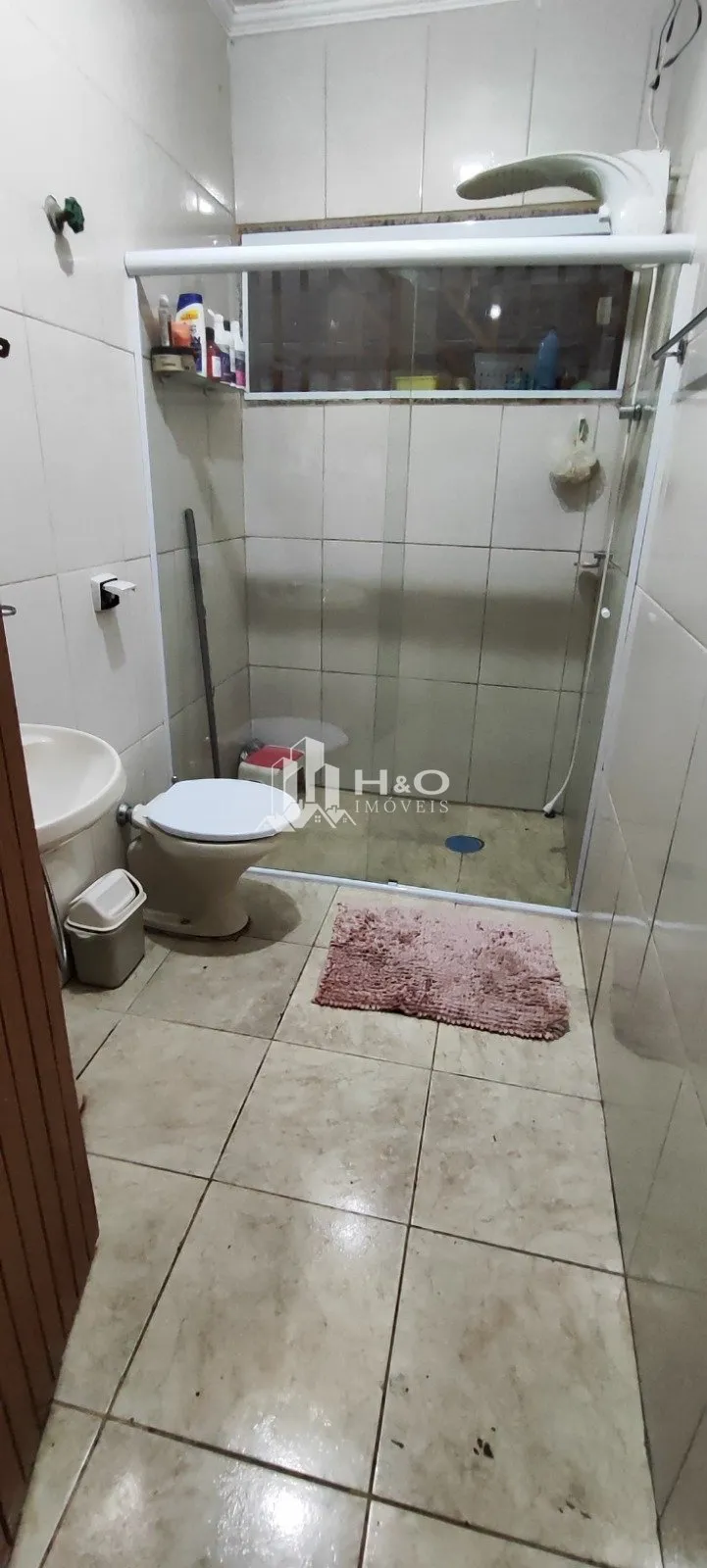 Imagem Sobrado à Venda com 4 Dormitórios no Parque Maria Luiza - Amplo Quintal e Ótima Localização