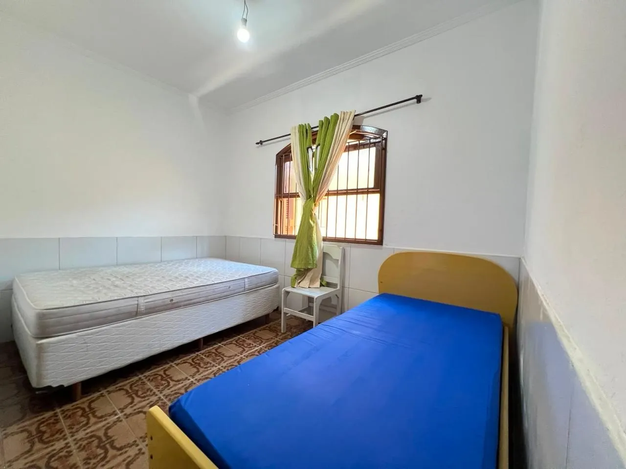 Imagem Casa para Venda em Praia Grande, Maracanã, 2 dormitórios, 1 suíte, 1 banheiro, 2 vagas