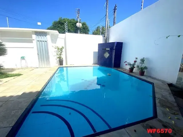 Imagem Casa com 4 Quartos à Venda, 318 m² em Edson Queiroz - Fortaleza