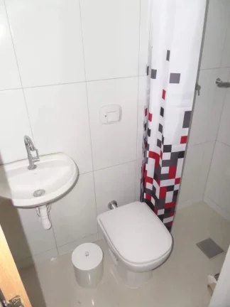 Imagem APARTAMENTO COM 3 QUARTSO E 2 SUÍTES A VENDA DE FRENTE PARA O MAR NA PRAIA DO MORRO GUARAPARI-ES.