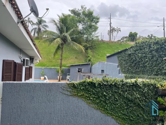 Imagem Casa em Condomínio a venda, 04 quartos sendo duas suítes, piscina em Cajati SP