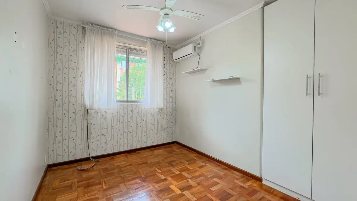 Imagem Sobrado de 3 dormitórios e 91m² à venda em Parque Santa Fé, Porto Alegre.