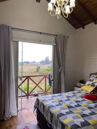 Imagem Casa à venda em Imbituba-SC, Alto Arroio: 4 quartos, 1 suíte, piscina e 150m² - Imperdível!