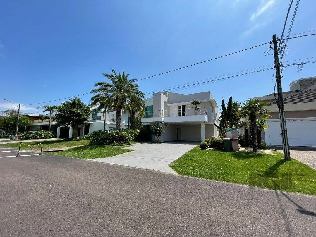 Imagem Casa de Condomínio em Atlântida Sul