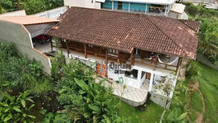 Foto do imóvel Casa com 4 dormitórios à venda, 180 m² por R$ 1.025.000,00 - Enseada - Ubatuba/SP