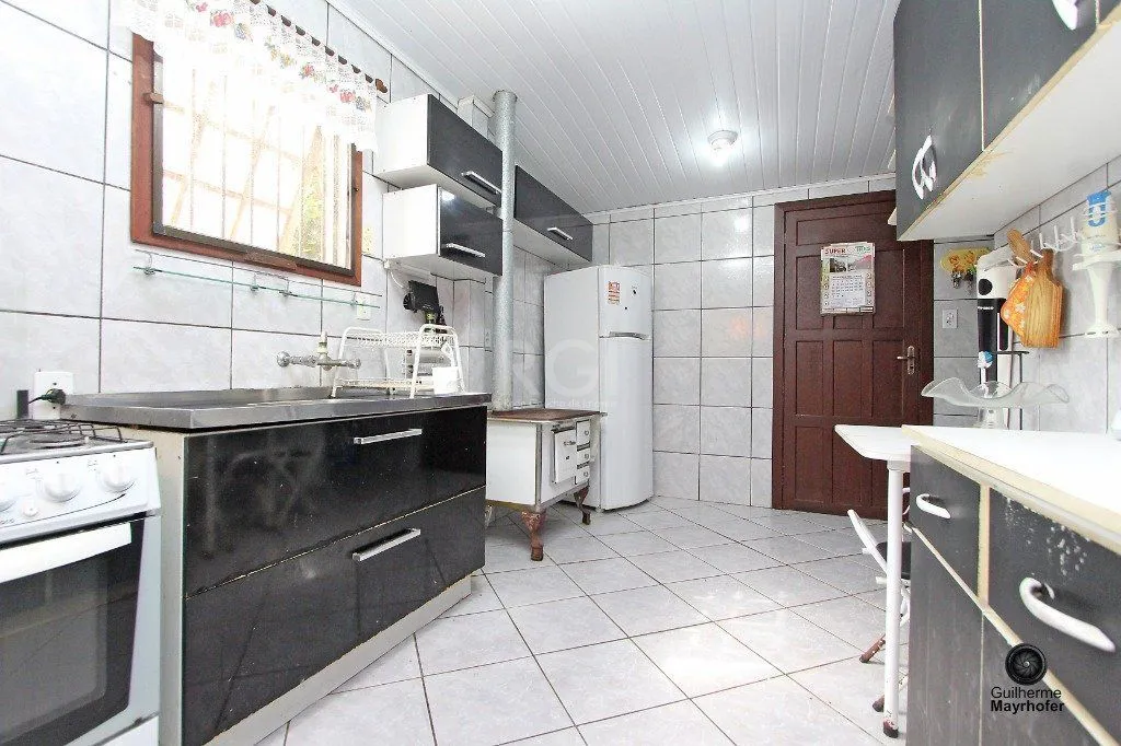 Imagem Casa para Venda - 150m², 2 dormitórios, 2 vagas - Nonoai