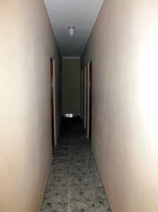 Imagem casa lado praia- tres dormitorios