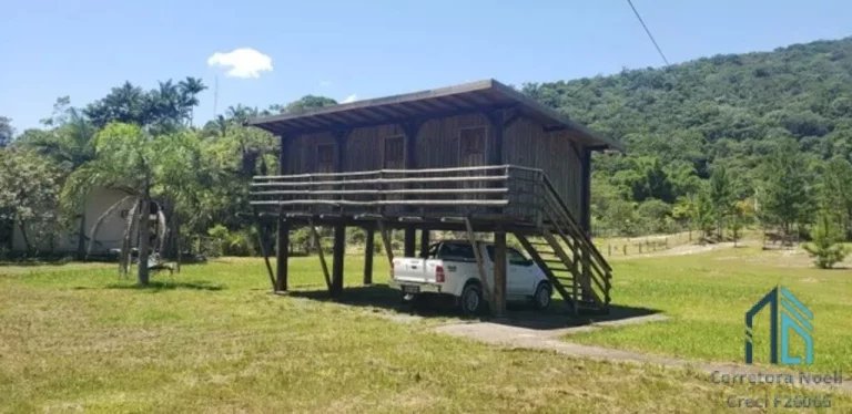 Imagem Sítio plana, 24.200 mil m², lagoa c/ peixes, área gourmet, fibra ótica, em ITAJAÍ SC