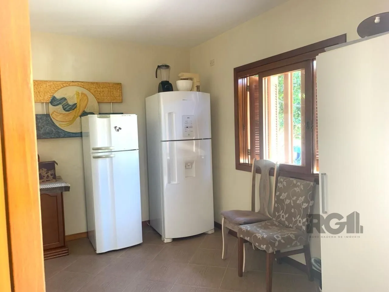Imagem Casa com 3 quartos, 1 suíte, 3 vagas e 182m² para vender por R$ 890.000