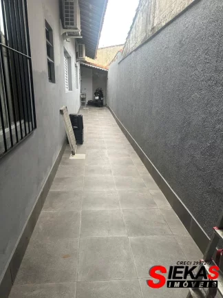 Imagem Oportunidade imperdível: Casa à venda em Praia Grande-SP, Maracanã - 2 quartos, 1 suíte, 1 sala, 2 banheiros, 2 vagas, 120 m².