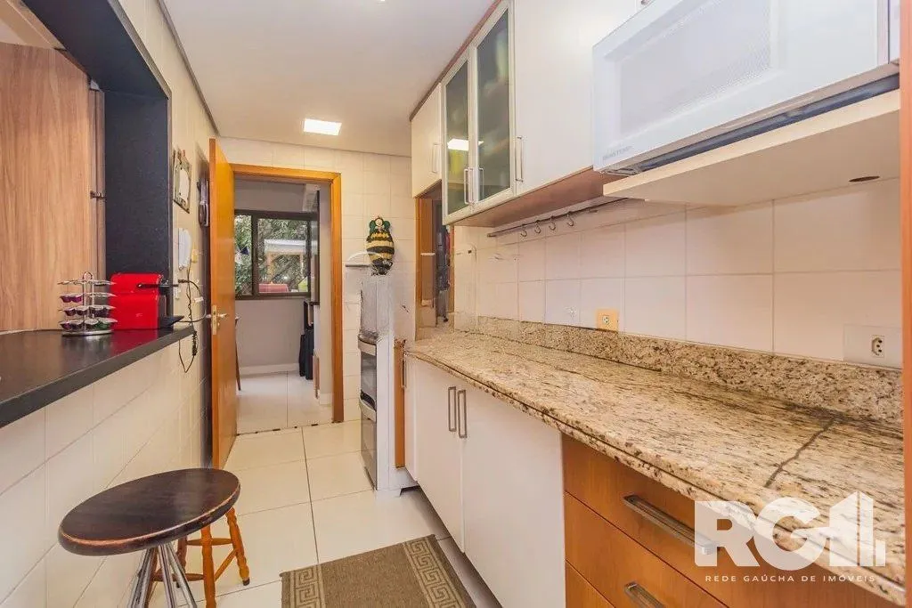 Imagem Apartamento com 94m², 3 quartos, 1 suíte, 2 vagas, no bairro Cristo Redentor em Porto Alegre..