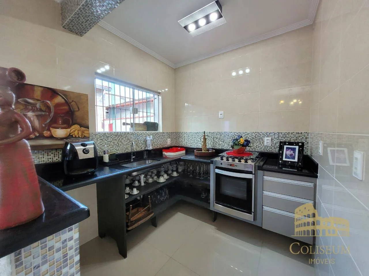 Imagem Casa com 2 dormitórios à venda, 112 m² por R$ 930.000,00 - Vila Assunção - Praia Grande/SP
