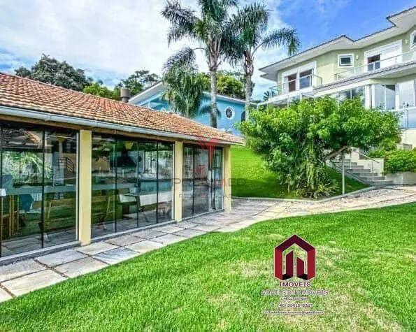 Foto do imóvel Casa Exclusiva Frente Mar em Florianópolis Cacupé 5 Quartos com Acesso Privativo à Praia em Servidão Cacupé - Cacupé, Florianópolis - SC