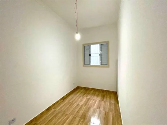Imagem Casa com 2 dormitórios à venda, 130 m² por R$ 400.000 - Caiçara - Praia Grande/SP