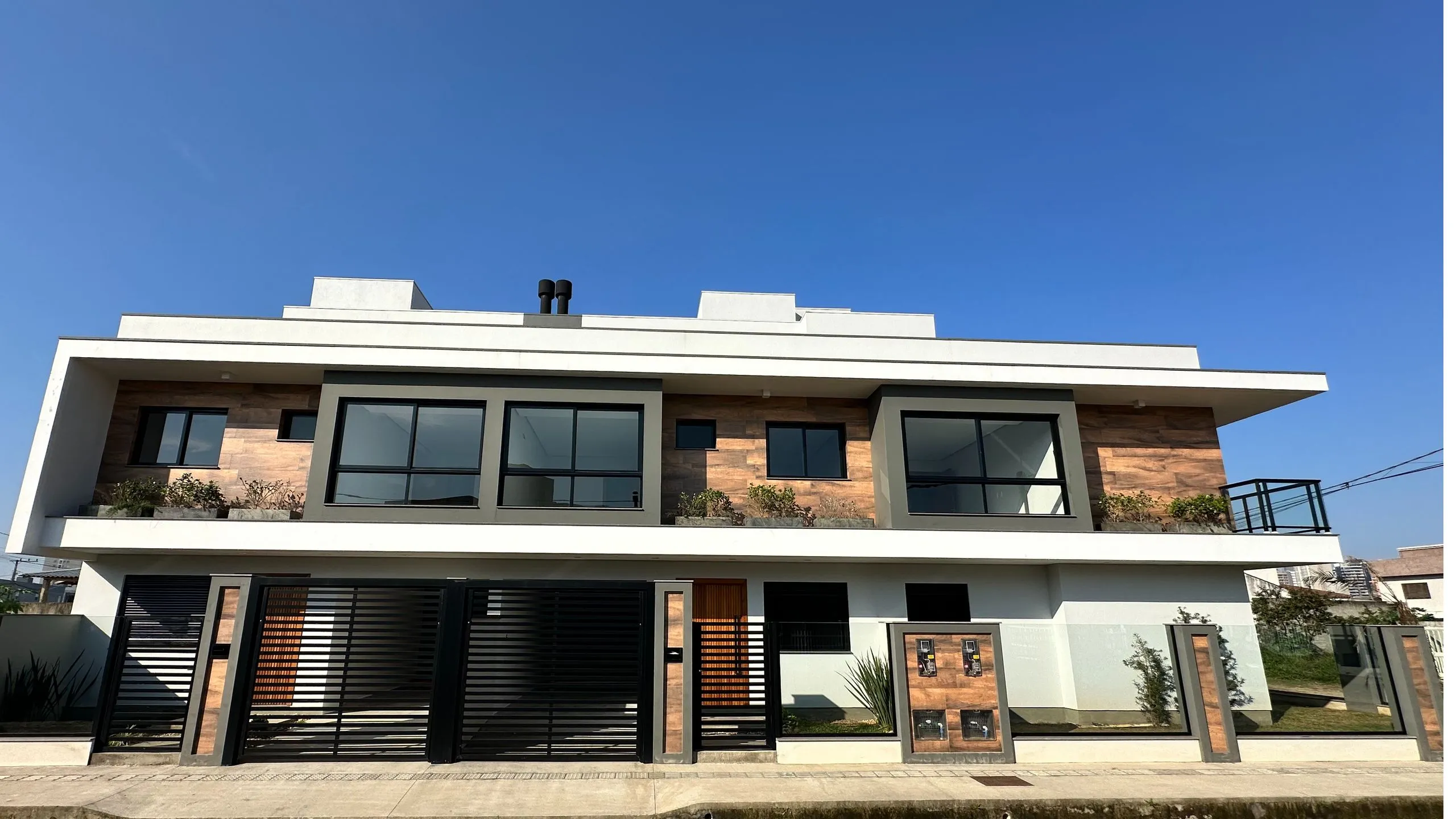 Foto do imóvel Triplex à venda em Passo de Torres, Centro, com 3 quartos, 180m2 em Rua João Rodrigues da Silva