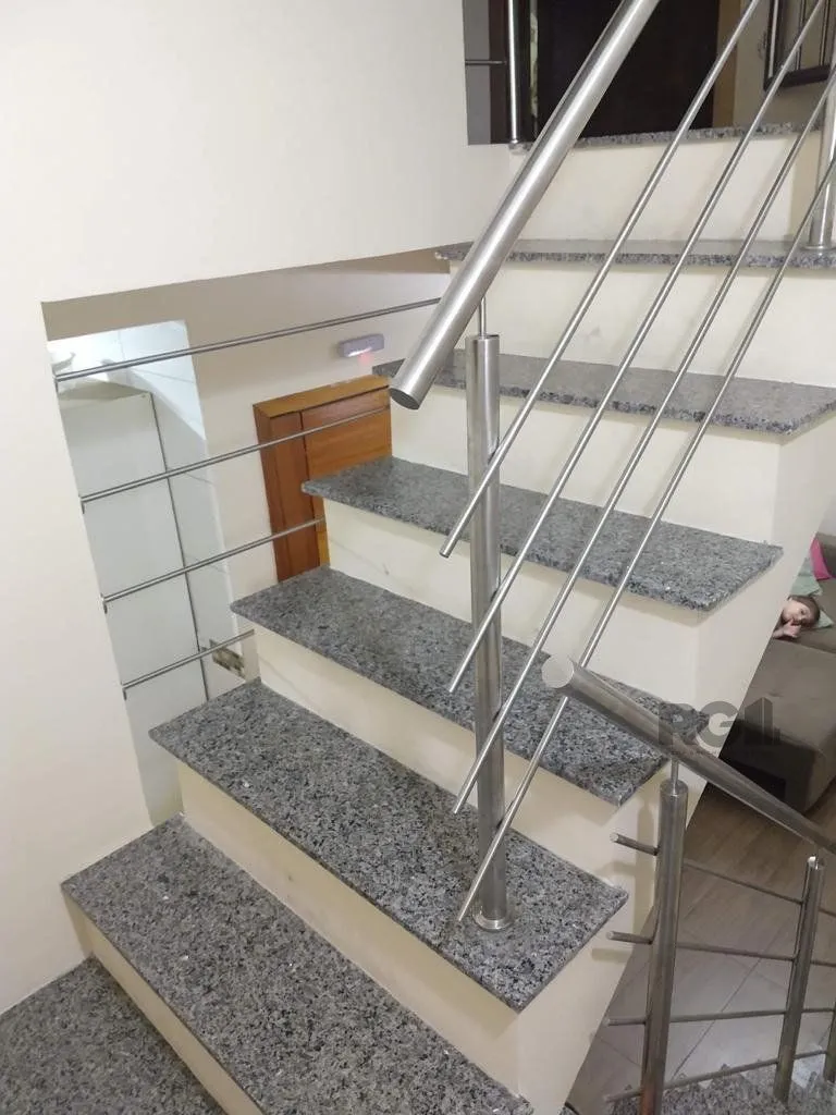 Imagem Casa 3 quartos, 4 vagas, salão de festa, sacada 198m² bairro Rubem Berta, Poa/RS