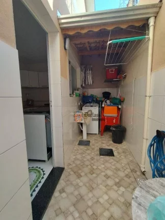 Imagem Sobrado com 2 dormitórios à venda, 59 m² por R$ 399.000 - Aviação - Praia Grande/SP
