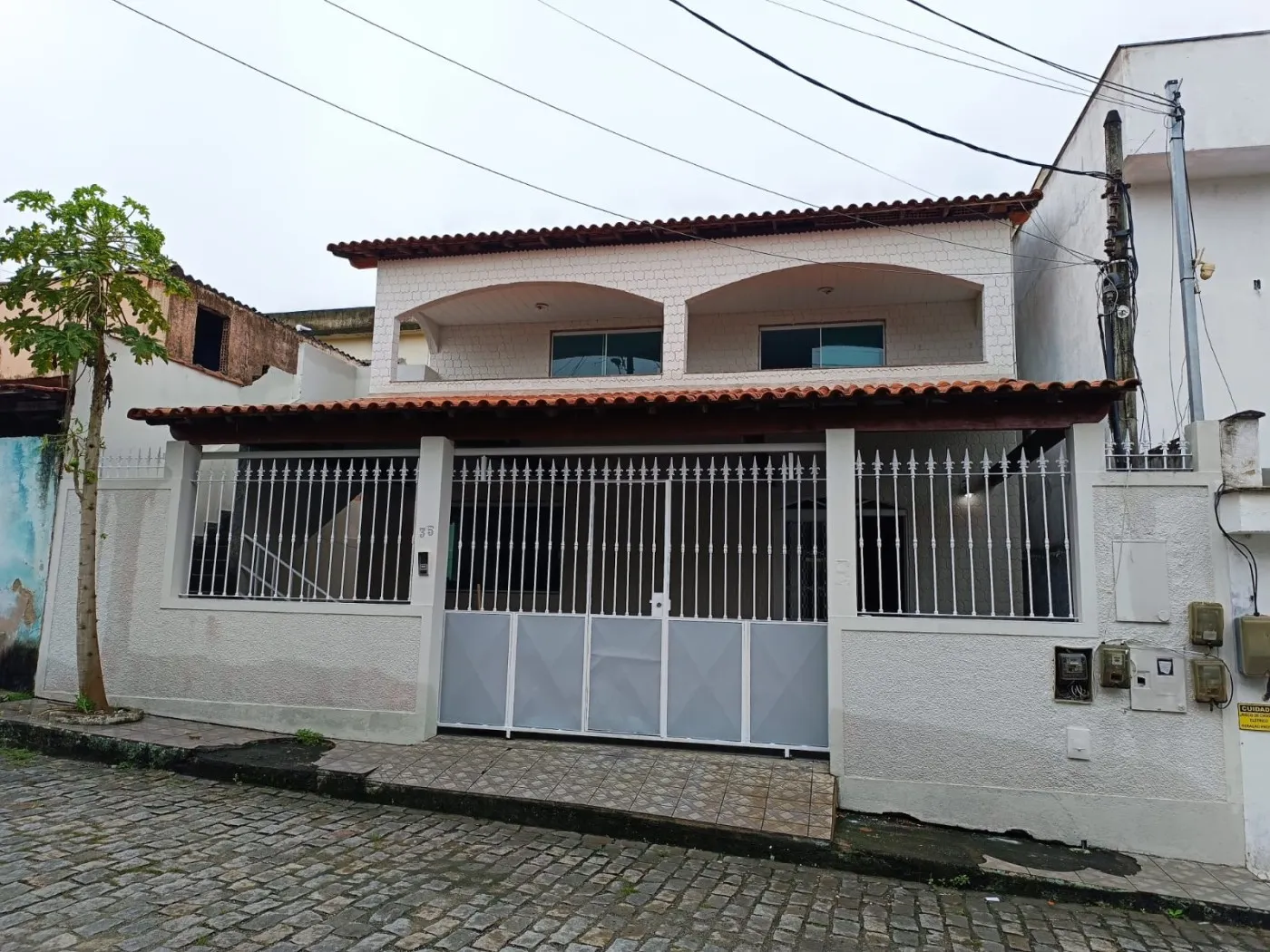 Foto do imóvel Casa em Condomínio para Venda em Itaboraí, Centro (Manilha), 4 dormitórios, 1 suíte, 2 banheiros, 1 vaga