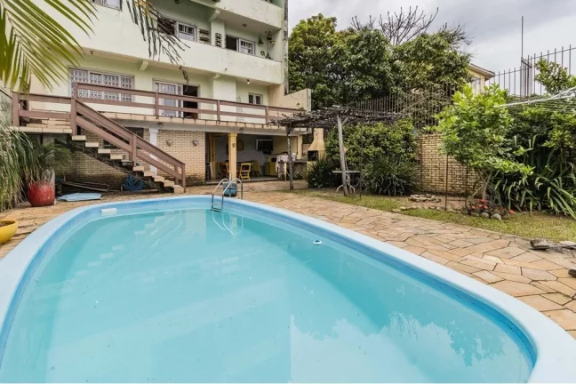 Imagem Casa com 3 Quartos à Venda, 464 m² em Santo Antônio - Porto Alegre