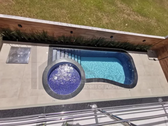 Imagem CASAL IMÓVEIS VENDE CASA NO CONDOMÍNIO JARDINS DO LAGO 4 SUÍTES PISCINA ADULTO E INFANTIL PRIVATIVA E SISTEMA FOTOVOLTAICA