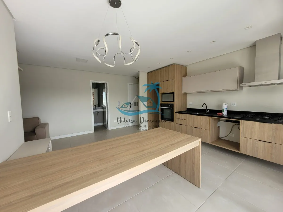 Imagem Excelente Apartamento com 3 dormitórios semi mobiliado e vista para o mar, a venda a 250 metros da orla de Itagua em Ubatuba.