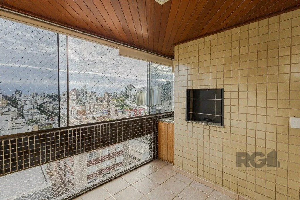 Imagem Vende-se excelente apartamento 3 quartos c/ suíte, 2 vagas, living com lareira, sacada e churrasqueira - 97m² - Auxiliadora
