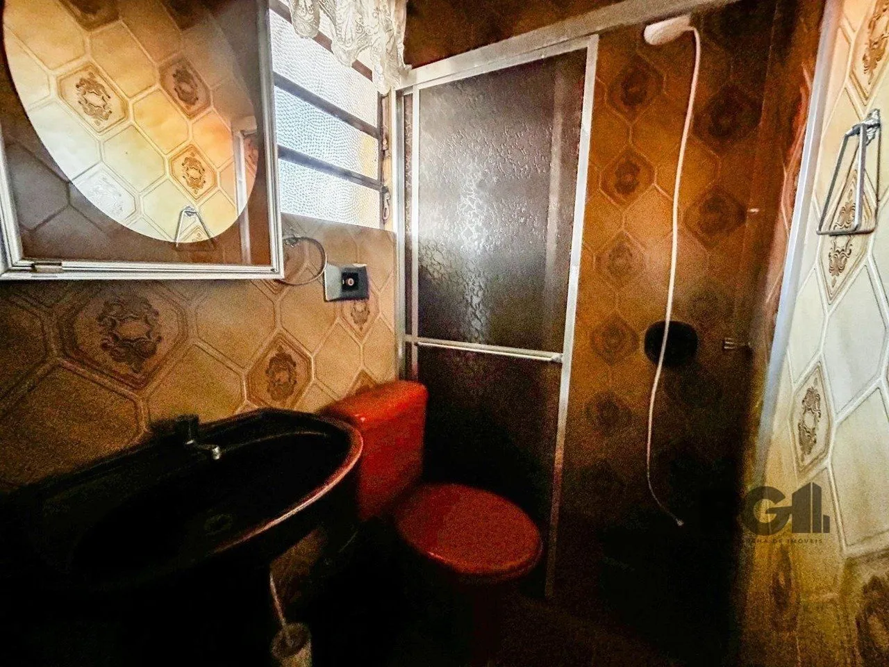 Imagem Casa com 2 salas comerciais, 3 quartos, vaga de garagem churrasqueira, suíte, no bairro Cavalhada, Porto Alegre/RS