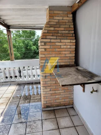 Imagem Casa Sobre Loja com 3 Dormitórios, Suíte e Área de Churrasqueira