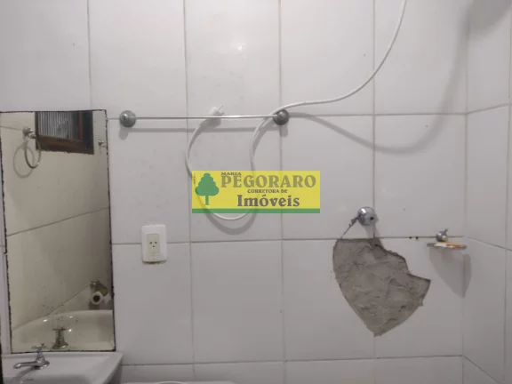 Imagem Casa à venda em Caraguatatuba-SP, bairro Rio do Ouro: 2 quartos, 2 salas, 2 banheiros, 2 vagas de garagem, 127m² - com piscina e churrasqueira!