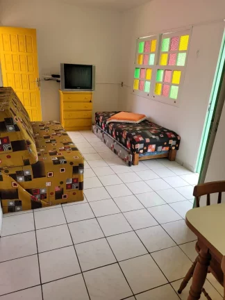 Imagem Oportunidade Única: Pousada Histórica à venda em Garopaba-SC, a 1 Quadra da Praia Central!