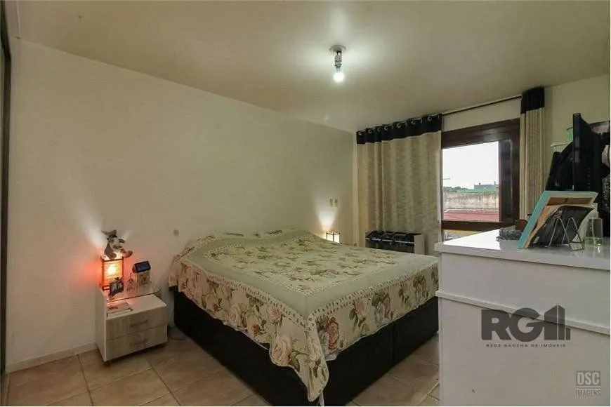 Imagem Casa de 285m² - 4 dormitórios, 4 vagas no bairro Bom Jesus
