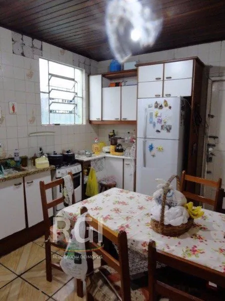 Imagem Casa para Venda - 90m², 3 dormitórios, 1 vaga - Partenon