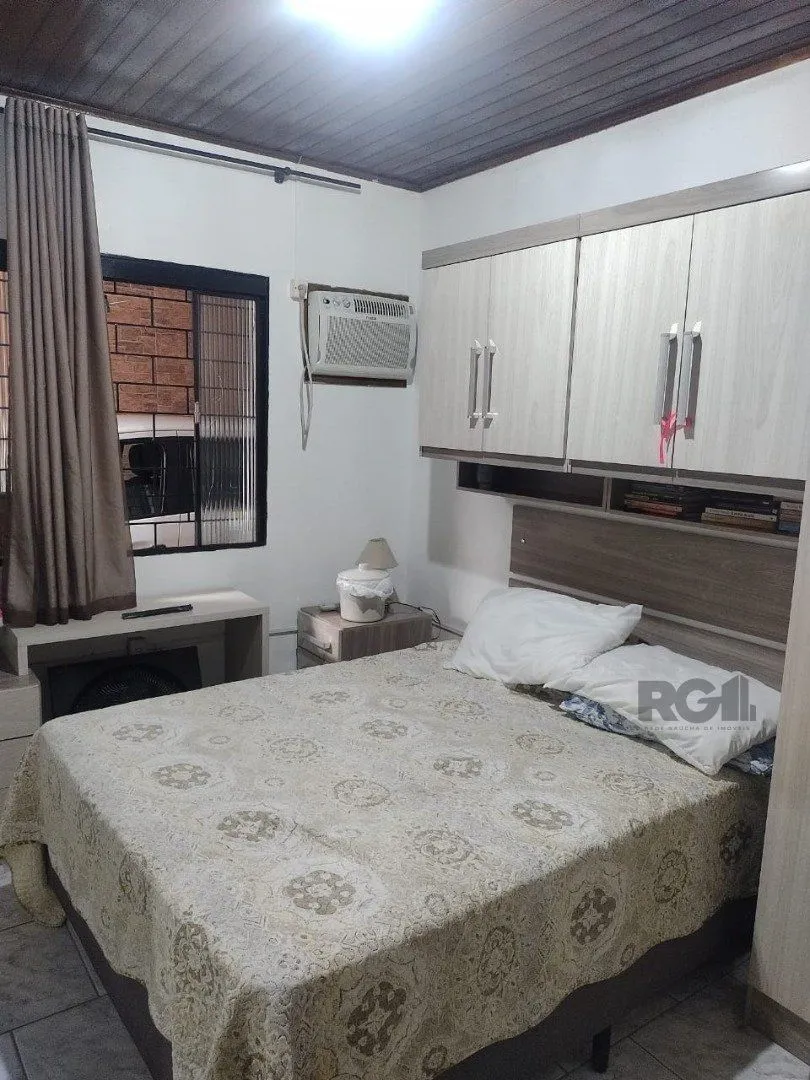 Imagem Casa de 3 dormitórios, 1 suíte e 2 vagas de garagem em Viamão.