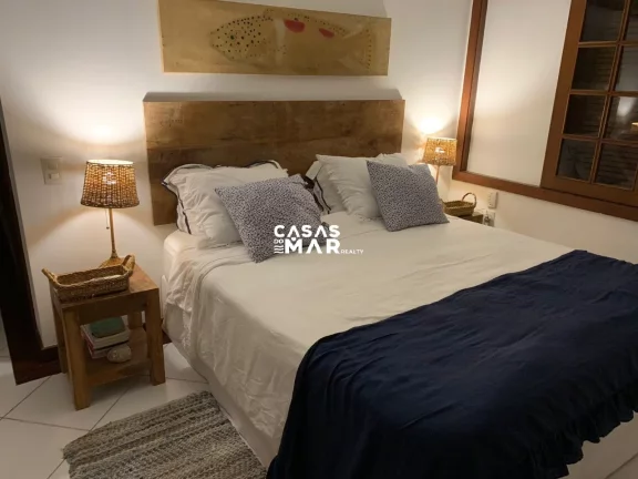 Imagem Casa de Luxo à Beira-Mar em Búzios, Condomínio Camurupim na Praia Rasa: 6 Quartos, 6 Suítes, 4 Salas - Segurança e Conforto!