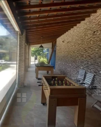 Imagem Casa de 7 dormitórios, 4 suíte, 6 banheiros e 2 vagas, com 327,695m² construída e 1.047,75m² total em Centervalle, Bertioga