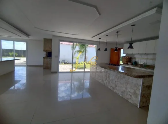 Imagem Casa térrea, com SETE suítes em condomínio fechado