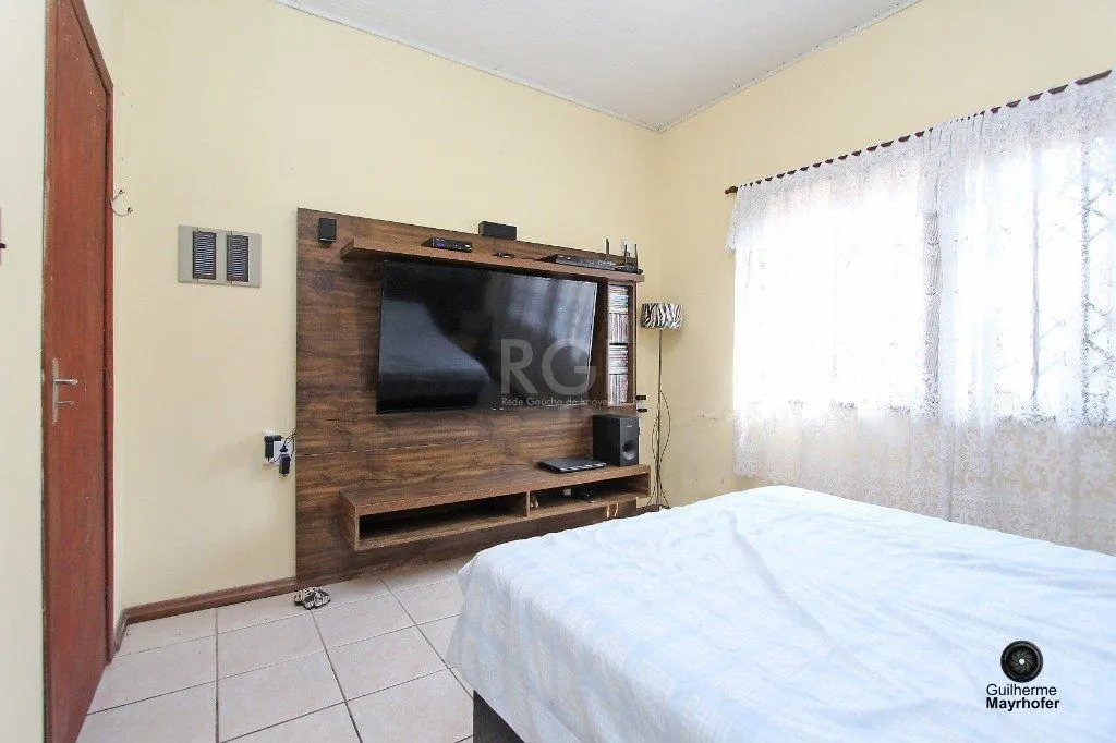 Imagem Casa para Venda - 150m², 2 dormitórios, 2 vagas - Nonoai
