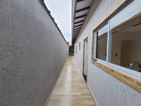 Imagem Casa com 2 dormitórios à venda, 74 m² por R$ 470.000,00 - Caiçara - Praia Grande/SP