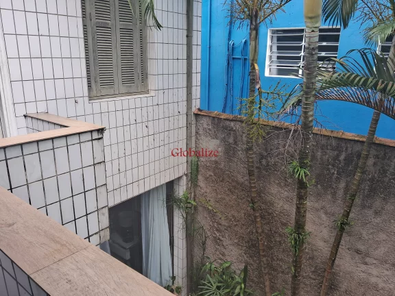 Imagem Sobrado para reforma em Santos na Vila Belmiro com 2 dormitórios, garagem e quintal nos fundos com piscina à venda por R$ 1.365.000,00