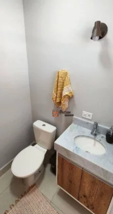 Imagem Sobrado triplex com 2 suítes à venda, 199 m² por R$ 675.000 - Massaguaçu - Caraguatatuba/SP